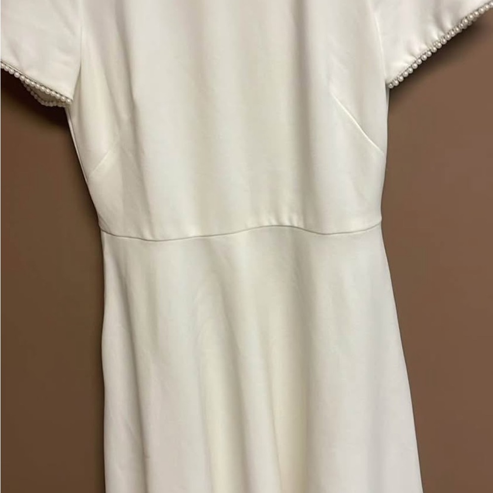 Elegant White Dress with Pearl Details